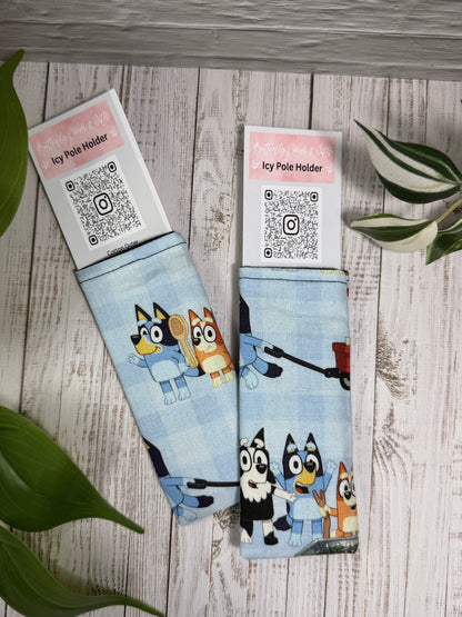 Fabric Icy Pole Holder with  cartoon bluey characters on a wooden surface, accompanied by a QR code card.