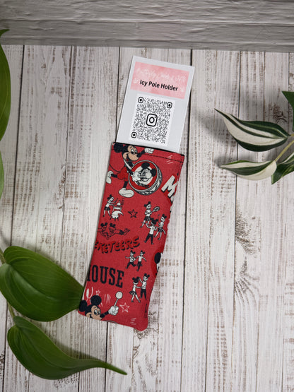 Fabric Icy Pole Holder with  cartoon characters on a wooden surface