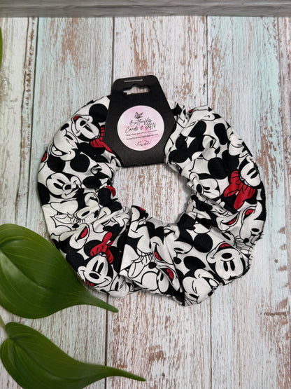Scrunchie with cartoon character pattern on a wooden surface
