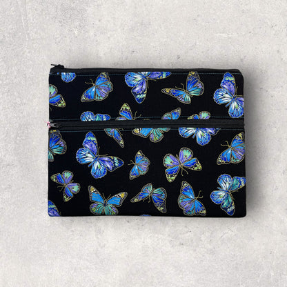 Ipad/tablet sleeve with colourful butterflies on a marble surface