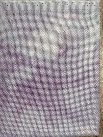 Textured aida fabric with a gradient of purple and gray